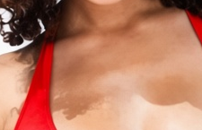 Kai: cropped approved source for the lighter chest pigmentation. This is source evidence, not a newly invented skin feature or a medical diagnosis.